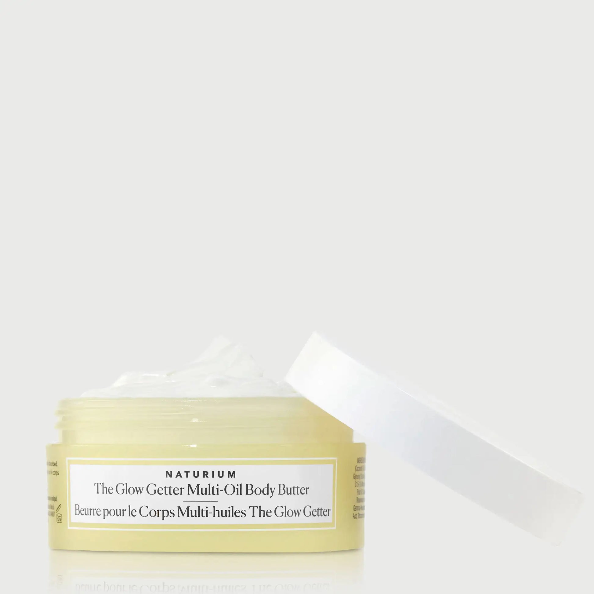 the-glow-getter-multi-oil-body-butter-travel-size-h2 NATR-40115_Glow-Getter-Body-Butter-Mini_front_capoff_bonebkgd.webp